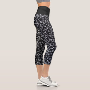 White floral design on black capri leggings