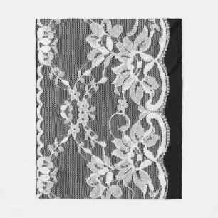 White floral lace: black background. fleece blanket