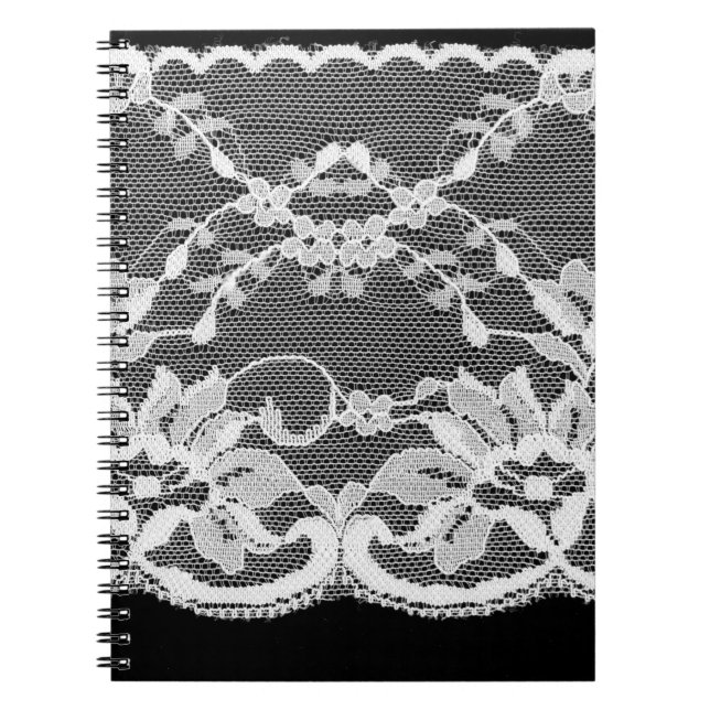 White floral lace on a black background. notebook (Front)