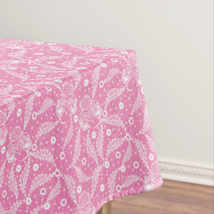 White floral lace on pink background tablecloth