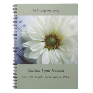 White flower on music memorial notebook