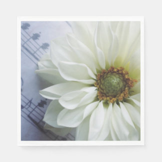 White flower on music napkin