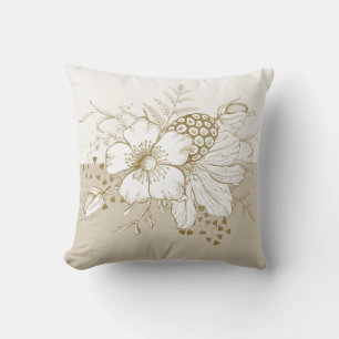White flowers gold outline accents cushion