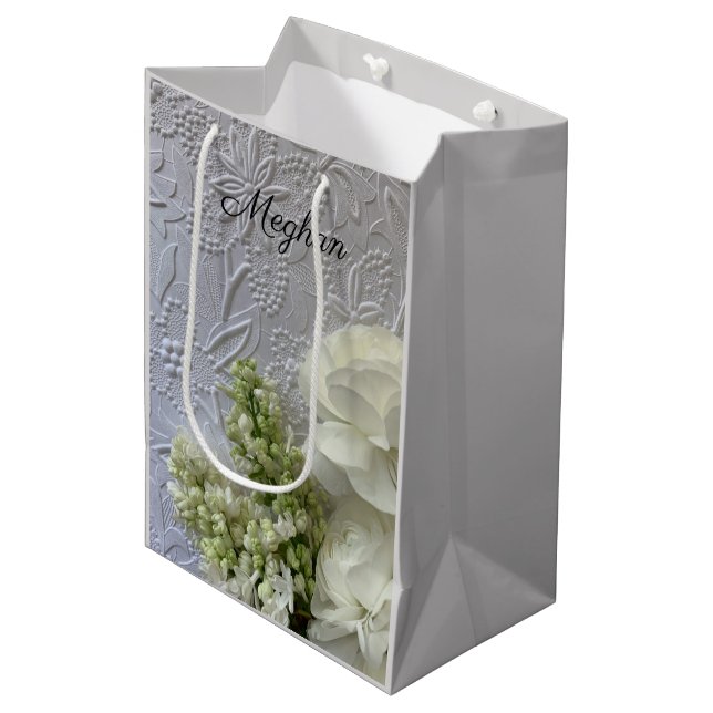 White flowers on embossed background medium gift bag (Front Angled)