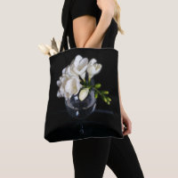 white freesia in a glass