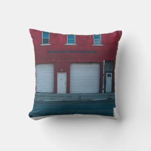 WHITE GARAGE DOORS CLOSED DURING DAYTIME CUSHION