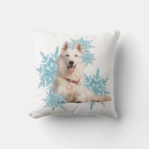 White German Shepherd laying in the Snowflakes Cushion