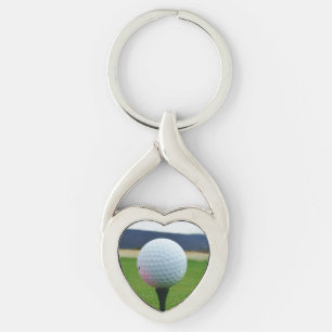 white Golf Ball on a mountain golf course Key Ring