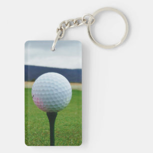 white Golf Ball on a mountain golf course Key Ring