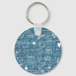 White graffiti on blue wall modern text art key ring