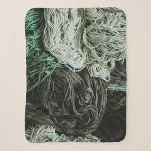 White, grey, and green ropes sherpa blanket