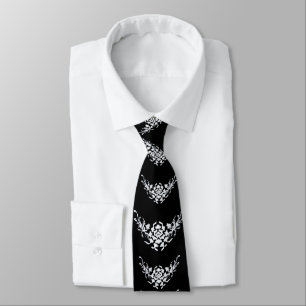 WHITE GRIFFINS AND FLOWERS IN BLACK TIE
