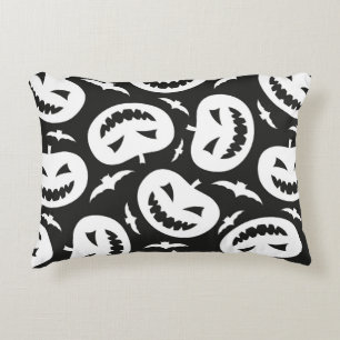 White halloween pumpkins and bats isolated on blac decorative cushion