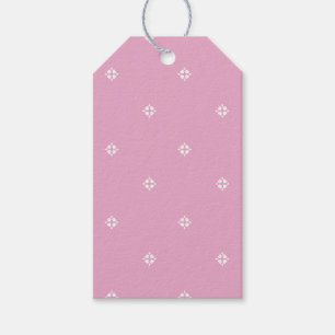 White hearts on pink gift tag for Valentine's Day