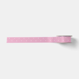 White hearts on pink ribbon for wrapping gifts. satin ribbon