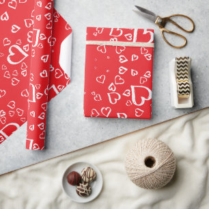 White hearts on red background wrapping paper