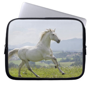white horse running on meadow laptop sleeve