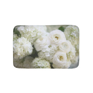 White hydrangeas and ranunculus bath mat