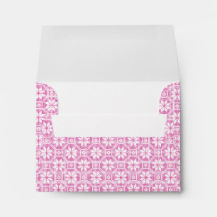 White isolated lace texture on pink background envelope