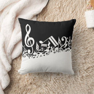 White Jumbled Musical Notes on Black Cushion