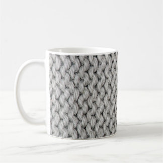 White knitted wool texture, close-up photo. coffee mug