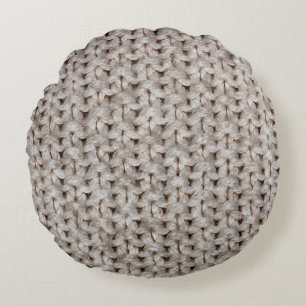White knitting wool: cosy texture. round cushion