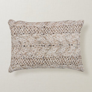 White knitting wool texture background. decorative cushion