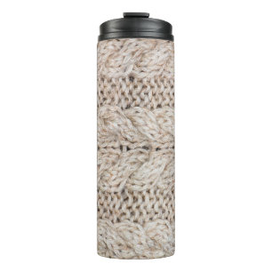 White knitting wool texture background. thermal tumbler