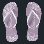 White Lace on Dusty Purple Bridesmaid Wedding Flip Flops<br><div class="desc">These beautiful wedding flip flops are a great way to thank and recognise your bridesmaids while saving their feet at the same time. Features an elegant design with white floral lace filigree on a dusty purple, lilac, or lavender coloured background. The elegant script lettering reads Bridesmaid with her name below....</div>
