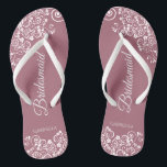 White Lace on Dusty Rose Bridesmaid Wedding Flip Flops<br><div class="desc">These beautiful wedding flip flops are a great way to thank and recognise your bridesmaids while saving their feet at the same time. Features a simple yet elegant design with white floral lace filigree on a dusty rose or mauve pink coloured background. The elegant script lettering reads Bridesmaid with her...</div>