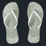 White Lace on Sage Green Bridesmaid Wedding Flip Flops<br><div class="desc">These beautiful wedding flip flops are a great way to thank and recognise your bridesmaids while saving their feet at the same time. Features an elegant design with white floral lace filigree on a dusty purple, lilac, or lavender coloured background. The elegant script lettering reads Bridesmaid with her name below....</div>