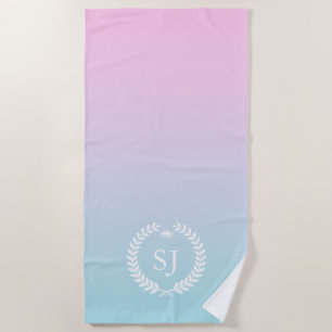 White laurel wreath on soft pink to blue ombre beach towel