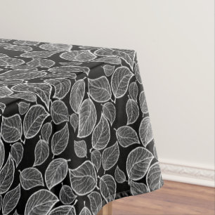 White Leaves on Black Tablecloth