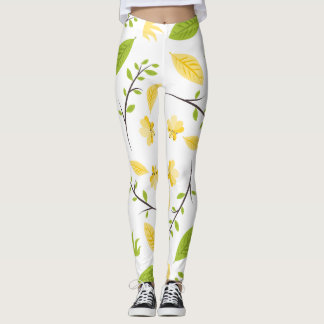 White legging with green leaves and  yellow flower