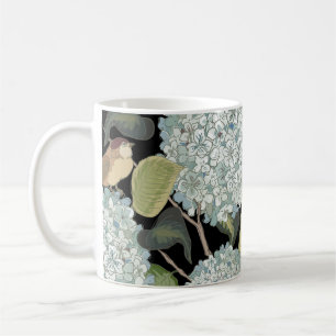 White, light blue Hortensia with green leaves and Coffee Mug