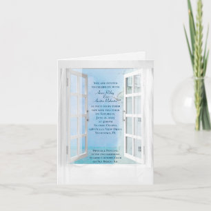 white lighthouse and ocean view in window invitation