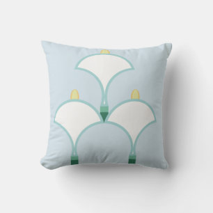 White lilies floral pattern on light blue cushion