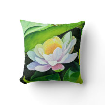 White Lily flower on green leaves