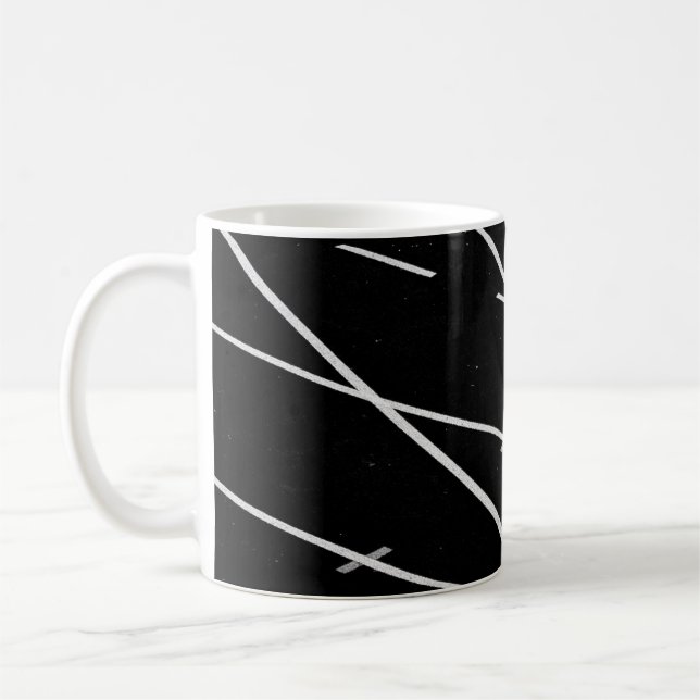 White lines on track field coffee mug (Left)