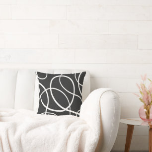 White Loops Against Black Background Cushion