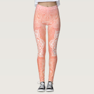 White mandalas on coral marble background leggings
