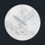 White Marble with Personalised Monogram and Name Round Clock<br><div class="desc">White Marble with Personalised Monogram and Name Gift
featuring monogram and name in grey modern sans serif font style on white marble background.

Perfect as housewarming gift,  wedding gift,  holiday gift,  family reunion gift and gift for any special occasions.</div>