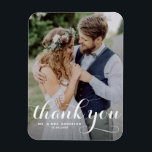 White Modern Calligraphy Photo Wedding Magnet<br><div class="desc">Celebrate your love and show gratitude with our customisable photo wedding thank you magnet! This unique keepsake is perfect for reminding your loved ones of your special day while expressing your heartfelt thanks in a memorable way. It features a modern typography photo overlay. Personalise by adding your photo and details....</div>