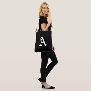 White monogram A on black Tote Bag
