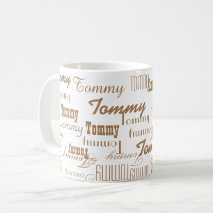 white mug with light brown pattern of name