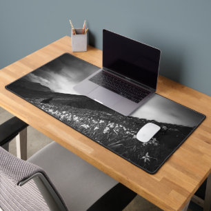 White narcissus flowers in darkness desk mat