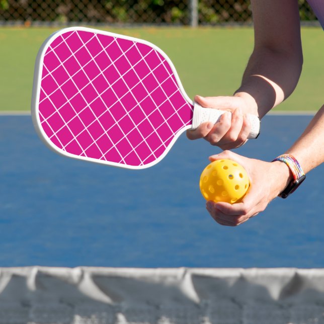 White net mesh on pink pickleball paddle (Insitu)