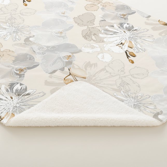 White orchids on a light cream   sherpa blanket (3/4)