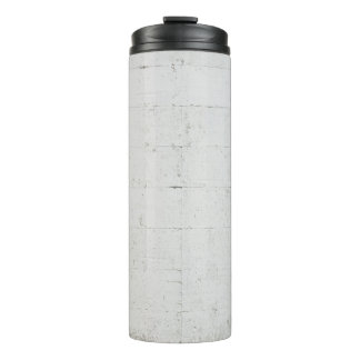 White painted concrete wall concrete thermal tumbler