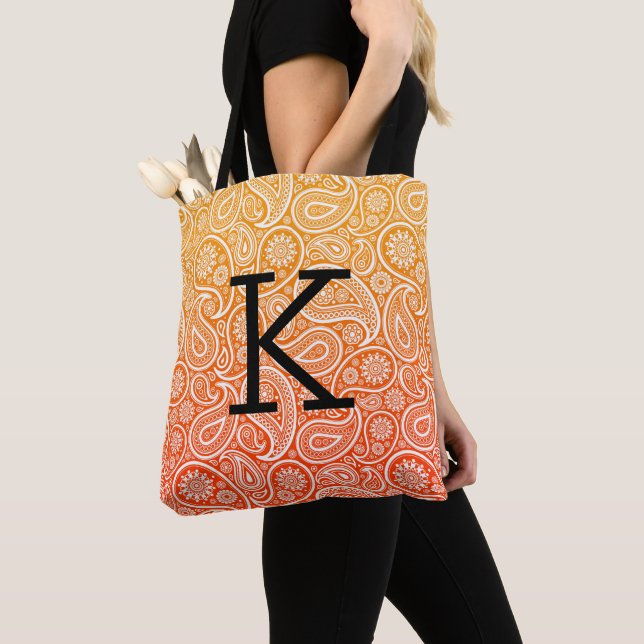 White paisley pattern on red to yellow ombre tote bag (Close Up)